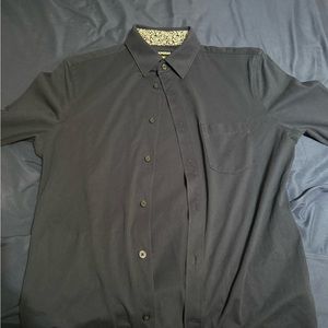 Dark blue button down shirt